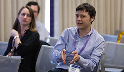 Research Computing consultant talking to group of workshop attendees